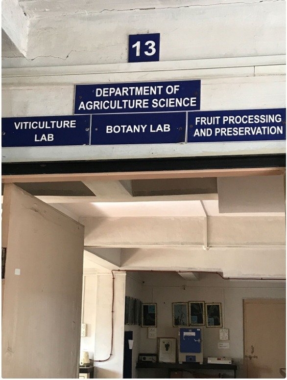 Main academic building with modern architecture and student entrance
